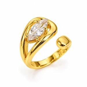 Anillo dorado abierto con circonia alargada y esfera