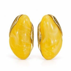 Aritos dorados con detalle amarillo ovalado