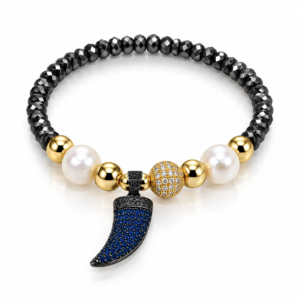 Pulsera negra con dije de colmillo azul