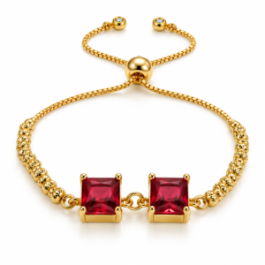 Pulsera dorada con dos cuadrados rojos