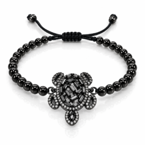 Pulsera negra con tortuga decorada
