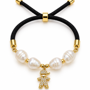 Pulsera negra y blanca con dije de niño