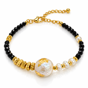 Pulsera negra con cuenta blanca decorada