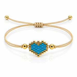 Pulsera beige con corazón azul de cuentas