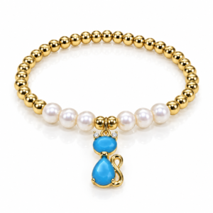 Pulsera dorada y blanca con gatito azul