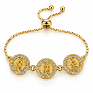 Pulsera dorada con tres medallas religiosas