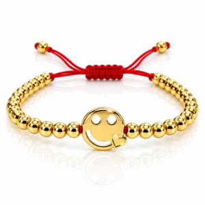 Pulsera roja con sonrisa dorada