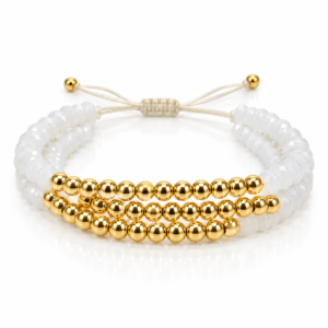 Pulsera blanca de tres hileras con cuentas doradas