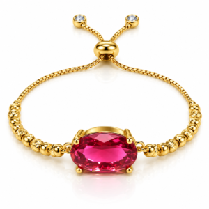 Pulsera dorada con óvalo fucsia