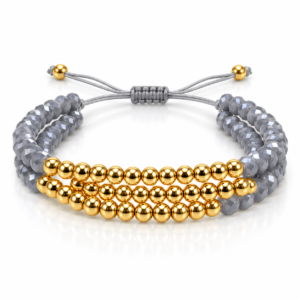 Pulsera gris de tres hileras con cuentas doradas