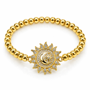 Pulsera dorada con sol y luna decorados