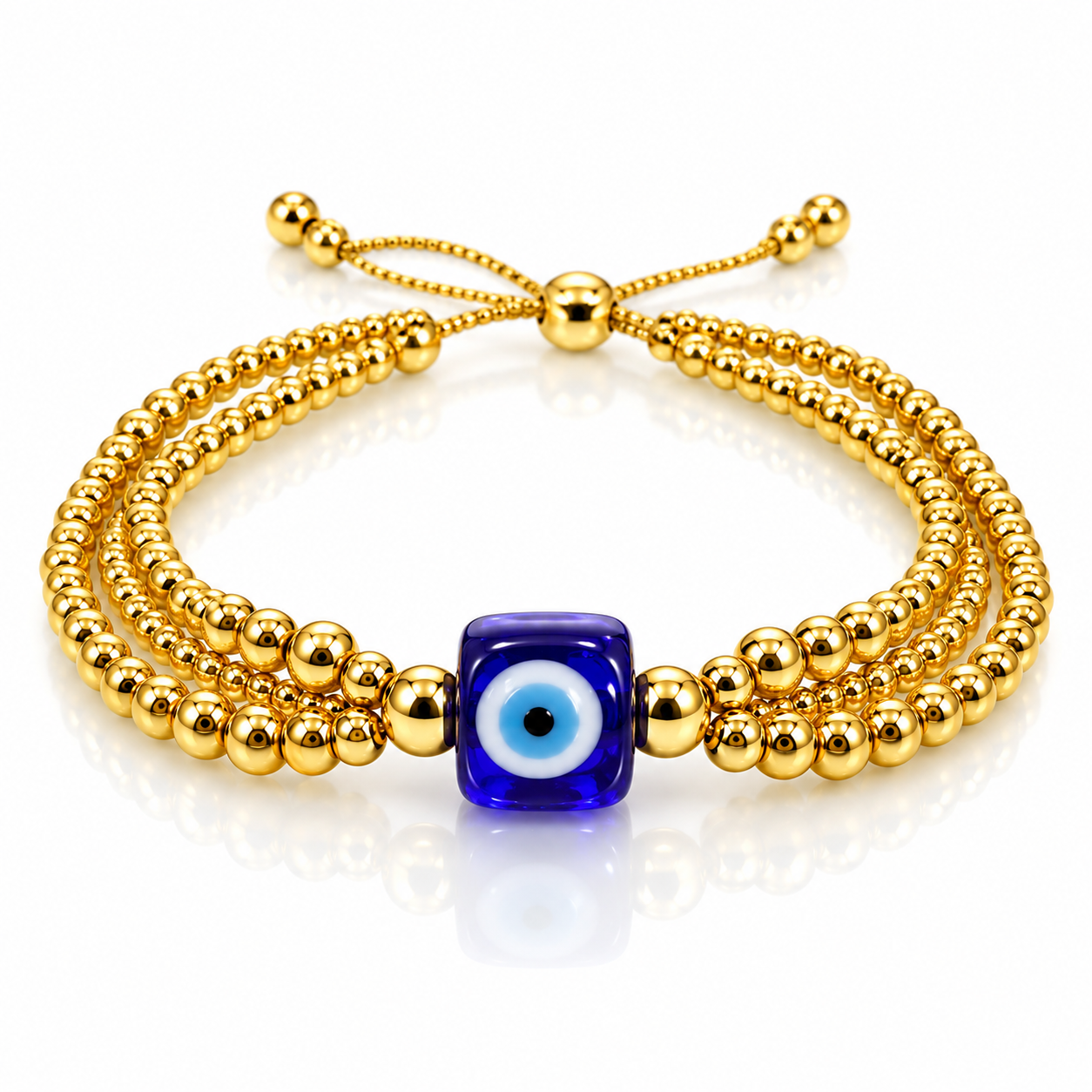 Pulsera dorada de tres hileras con ojo azul