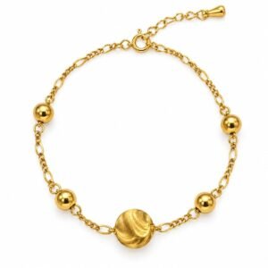 Pulsera dorada con esferas y centro texturizado