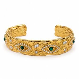Brazalete dorado con ojos verdes y circonias